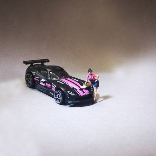 1-64 scale black-haired girl washing the car