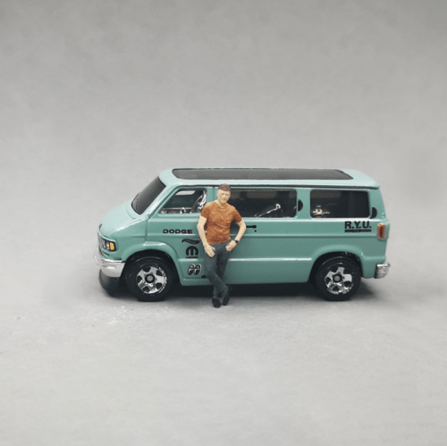 1-64 scale diorama man leaning on a car