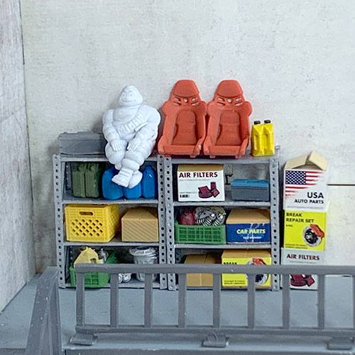 1-43-garage-diorama-racks-with-tools-and-spare-parts-with-michelin-figure